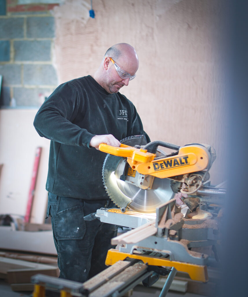 A JFD tradesperson at work on a renovation project